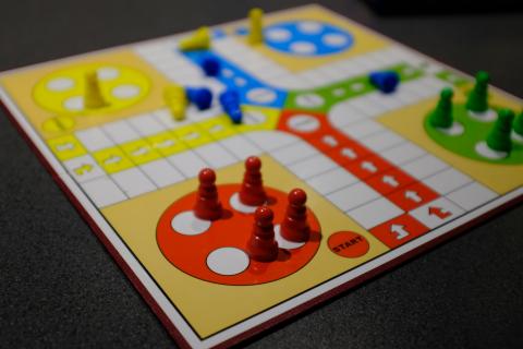 A colorful board game to represent library gaming events.