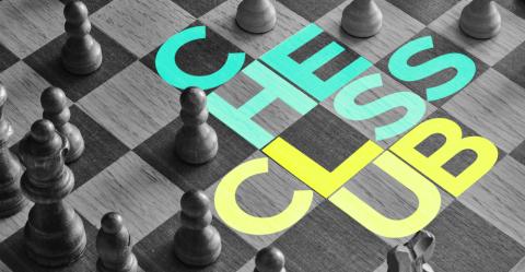 A chess board with the words "Chess Club" written on it.