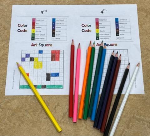 Colored Pencils and a color by number coloring sheet
