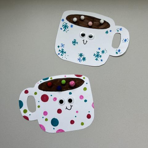 Mugs of hot cocoa made of paper. 