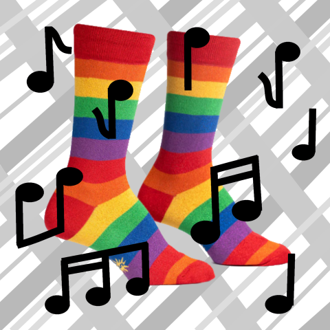 Rainbow colored socks with music notes all around them